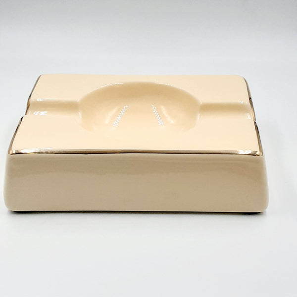 cream colored ashtraywith gold edging #5098